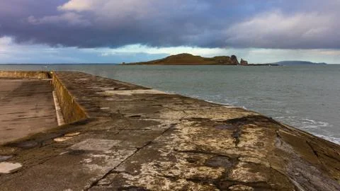 Jetty surrounding Howth harbor Stock Photos