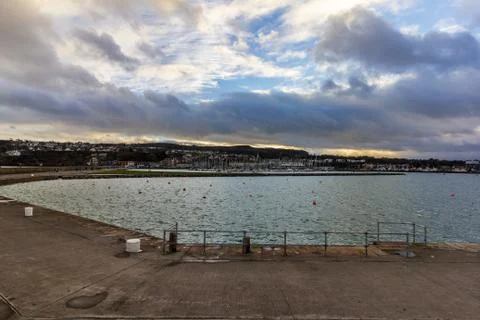 Jetty surrounding Howth harbor Stock Photos