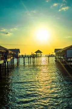 Jetty view with orange sunset Stock Photos
