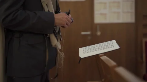 A Jew prays while standing, side view. Видео 175349515