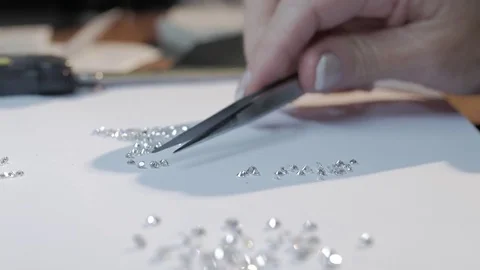 Jeweler Counting Small Diamonds Stock Footage 80209748