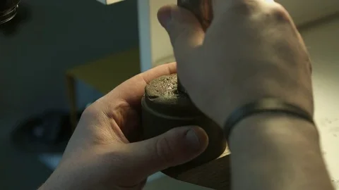 Jeweler makes marks with the help of a marker. Video stock 76325740