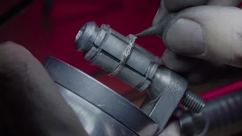 Jeweler Master. Preparing the mold for casting the ring Stock Footage 84692486