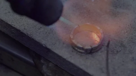 Jeweler Master Soldering the Components of the Ring Stock Footage 84692383