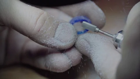 The jeweler preparing the mold for casting the ring Stock Footage 84692301