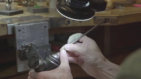 Jeweler working on wedding ring in workshop Stock Footage 82399940