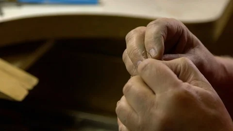 Jeweler in the workshop repairs an earring Stock Footage 108343824