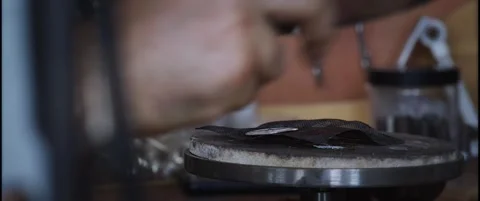 Jeweler's Torch Heating a Small Object on a Rotating Stand Vídeo Stock 342562910