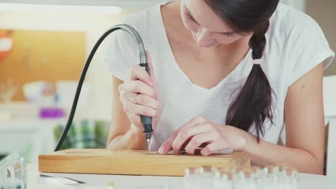 Jewelry designer working in studio, creating unique handmade pieces 스톡 동영상 69841709