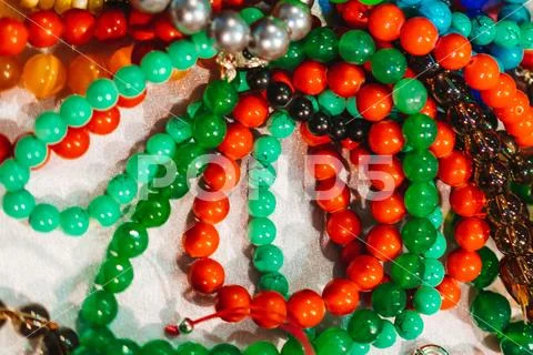 Jewelry made of base metals and ornamental stones Stock Photos