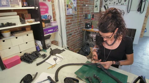 Jewelry maker making holes wide slide Stock-Footage 59609695