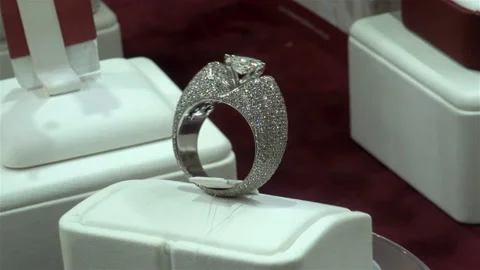 Jewelry ring with a gem on a rotating stand Stock Footage 120799703