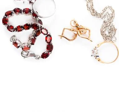 Jewelry with the ruby stones on the white Stock Photos