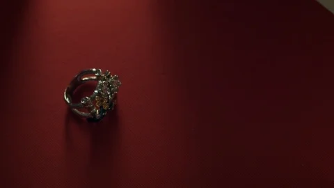 Jewelry stick ring on a red background, Vidéo 86574508