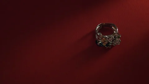 Jewelry stick ring on a red background, Stock Footage 86574535