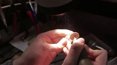 Jewelry work. Processing of silver ring. Close-Up. 4K UHD Stock Footage 71279915