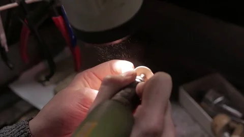 Jewelry work. Processing of silver ring. Close-Up. 4K UHD Stock Footage 71280154