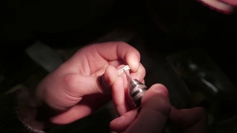 Jewelry work. Processing of silver ring. Close-Up. 4K UHD Stock Footage 71280646