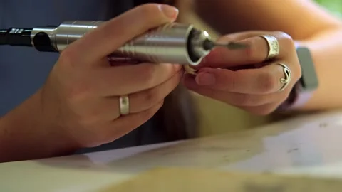 Jewelry workshop, ring sharpening with a drill Stock Footage 283000271