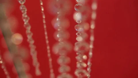 Jewels on red background Stock Footage 75177292
