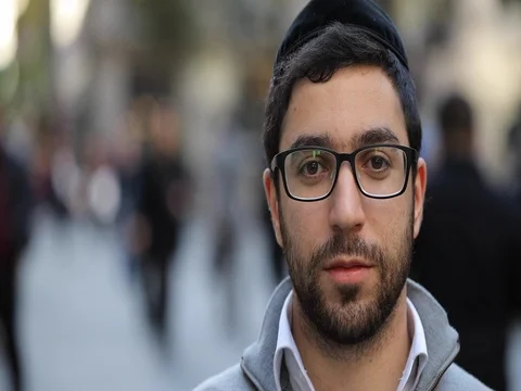 Jewish man in city face portrait serious Stock Footage