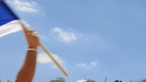 Jews dancing in a round with flag in Jerusalem Stock Footage 79592803