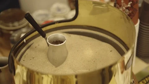 Jezve placed in sand Stock Footage 80733275