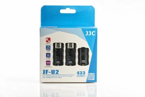 JF-U2 camera and flash triggers for Sony A7 III isolated on white Stock Photos