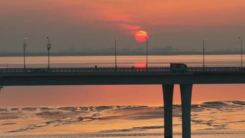 Jiashao Bridge at Sunset with Tidal Patterns in Qiantang River, Zhejiang Stock Footage 337527063