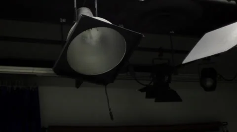 Jib up and down on studio scoop light mounted on grid Stock-Footage 34643542