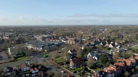 Jib up of busy intersection with traffic lights in beautiful town Stock Footage 169700502