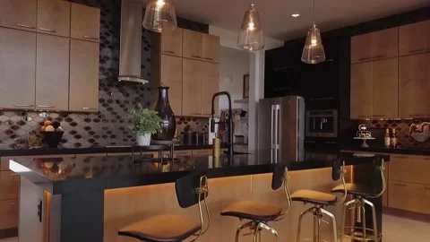 Jib from Chairs to Lights in kitchen Stock Footage 154332835