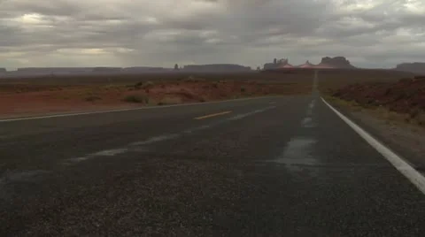 Jib shot up Monument Valley Highway Stock Footage 21663192