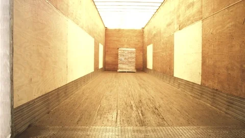 Jib shot of a worker pulling a pallet truck Stock-Footage 76534944