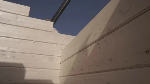 Jib. Wall of a house under construction from timber Stock Footage 106628036
