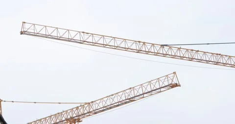 Jib of a yellow tower crane Stock Footage 146034462