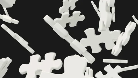 Jigsaw falls apart and one of its puzzle piece fills the screen. Stock Footage 109352139