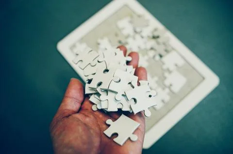 Jigsaw is a harmony among the group will not be impossible. Foto stock