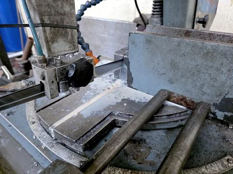 Jigsaw Machine in Operation During Woodworking Process at Workshop Stock Photos