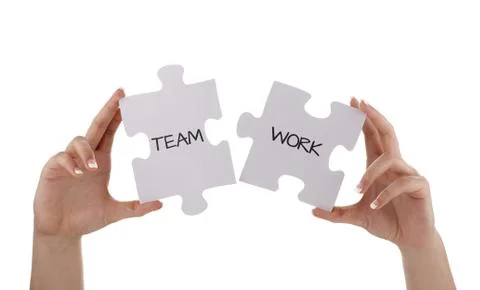 Jigsaw piece teamwork Stock Photos