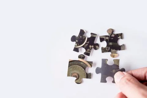 Jigsaw puzzle with image of machine Stock Photos