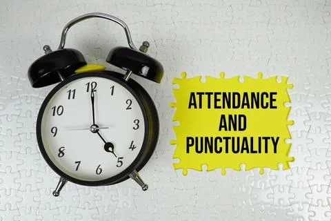 Jigsaw puzzle with a missing piece with "Attendance And Punctuality" and al.. Stock Photos