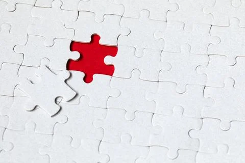 Jigsaw puzzle with missing piece. Missing puzzle pieces. Concept image of u.. Stock Photos