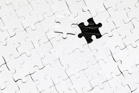 Jigsaw puzzle with missing piece. Missing puzzle pieces. Concept image of u.. Stock Photos