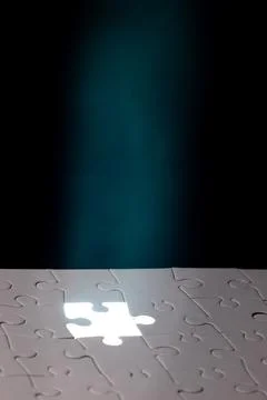 A jigsaw puzzle with a missing piece Stock Photos