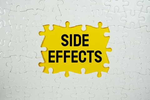 Jigsaw puzzle with a missing piece with "Side Effects" on yellow background Stock Photos