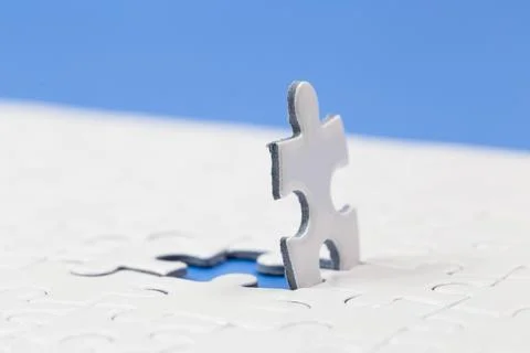 Jigsaw puzzle with one piece missing. business and success concept Stock Photos