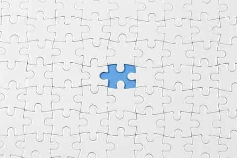 Jigsaw puzzle with one piece missing Stock Photos