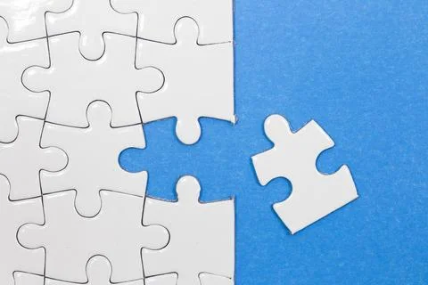 Jigsaw puzzle with one piece missing Stock Photos