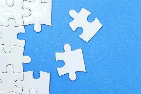 Jigsaw puzzle with one piece missing Stock Photos